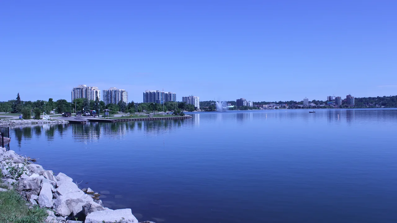 Barrie's waterfront on Kempenfelt Bay with the downtown skyline and lake fountain.