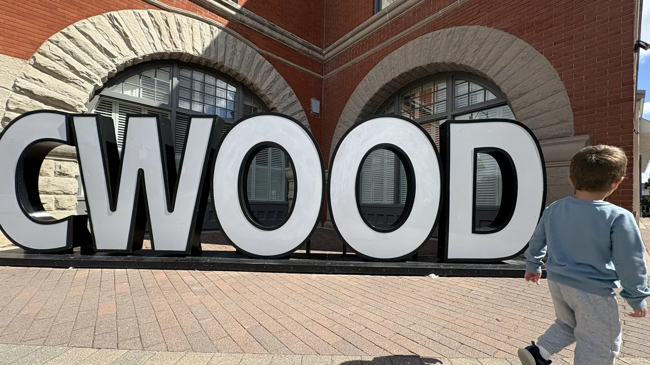 The downtown Collingwood welcome sign on a clear day.